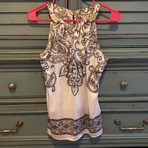 White and black XS top from Cache.